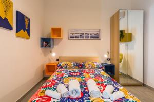 Posteľ alebo postele v izbe v ubytovaní #Casa Sofia - L'Oro di Napoli