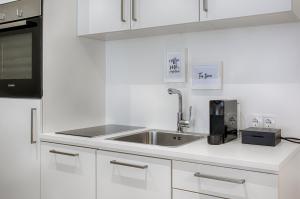 Η κουζίνα ή μικρή κουζίνα στο Business Hotel Maier