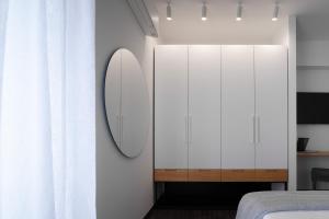 A bed or beds in a room at The H Experience Boutique Apartment Koules Fortress Heraklion
