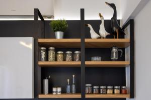 A kitchen or kitchenette at The H Experience Boutique Apartment Koules Fortress Heraklion