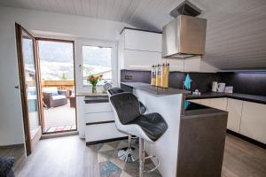 Kuchyň nebo kuchyňský kout v ubytování Appartement Zeitlos. °18