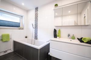 Kúpeľňa v ubytovaní Appartement Zeitlos. °18