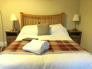 Ein Bett oder Betten in einem Zimmer der Unterkunft DAVAAR B&B