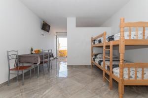 Posteľ alebo postele v izbe v ubytovaní Studio apartments Zloic in Krvavica