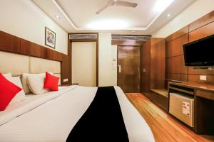 Katil atau katil-katil dalam bilik di OYO Townhouse 537 Regent Intercontinental