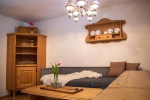 A bed or beds in a room at Haus Waldbach