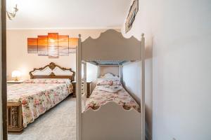 Postel nebo postele na pokoji v ubytování Clara Vista Mare - Goelba