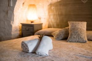 Voodi või voodid majutusasutuse Borgo D'Itria toas