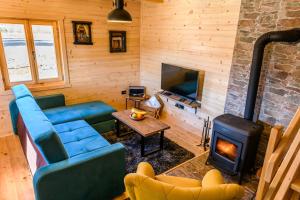 Posezení v ubytování Happy2cu Cabin