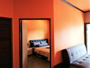 Phurafa Resort tesisinde bir odada yatak veya yataklar