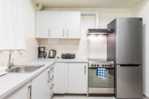 Majoituspaikan Athens Welcome Suites Apartments keittiö tai keittotila