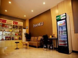 a restaurant with a drink machine in a store at Thank Inn Chain Hotel henan luoyang high-tech district jiudu west road zhoushan station in Luoyang