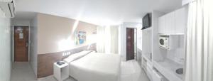 Kuchyň nebo kuchyňský kout v ubytování Hotel Corais de Tambau