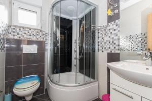 Kúpeľňa v ubytovaní Studio apartments Zloic in Krvavica