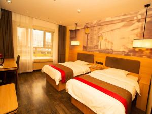 Voodi või voodid majutusasutuse Thank Inn Plus Hotel hebei hengshui taocheng district people's west road toas
