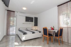 Posteľ alebo postele v izbe v ubytovaní Studio apartments Zloic in Krvavica