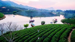 a view of a river with boats on it at Bong Mai Thai Hoa Hotel in Làng Dương +30 photos