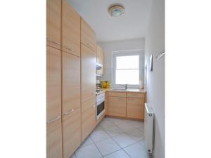 Kuchyň nebo kuchyňský kout v ubytování Ferienwohnung Duenenweg _ Haase