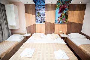 Postel nebo postele na pokoji v ubytování Hotel Herceg