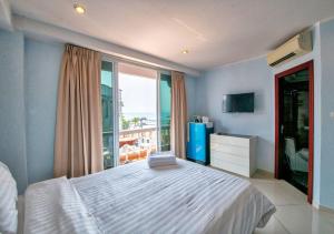Postel nebo postele na pokoji v ubytování Akvavit Living + 12 fotografií