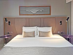 Postel nebo postele na pokoji v ubytování Marbella Resort