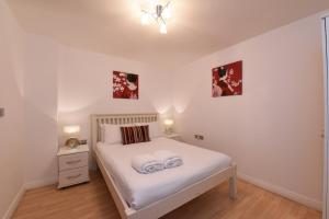 Postel nebo postele na pokoji v ubytování Dreamhouse Apartments Manchester City Centre