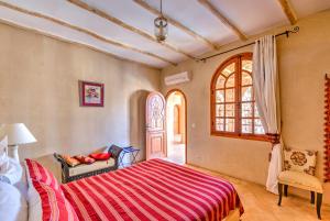 Riad Janoub客房内的一张或多张床位