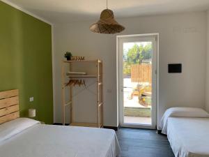 Rúm í herbergi á Cilento rooms