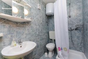 Koupelna v ubytování Apartments Boza