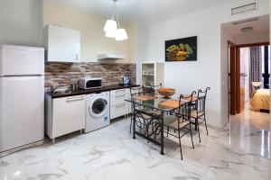 Kuchyň nebo kuchyňský kout v ubytování Peña 5 Apartments