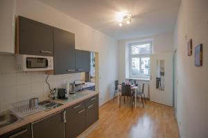 Kuchyň nebo kuchyňský kout v ubytování Cozy 2 ROOM APARTMENT - Enjoy Viennas summer Vibes