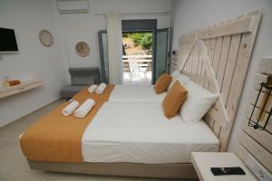 Posteľ alebo postele v izbe v ubytovaní Afrodite Luxury Rooms
