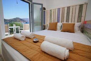Posteľ alebo postele v izbe v ubytovaní Afrodite Luxury Rooms