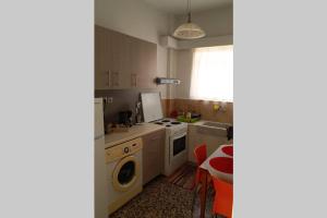 Kuchyňa alebo kuchynka v ubytovaní Ellis Apartments , Amperia , Crete + 16 fotografií
