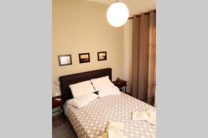 Posteľ alebo postele v izbe v ubytovaní Ellis Apartments , Amperia , Crete