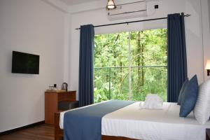 Letto o letti in una camera di Forest Edge Safari Villa