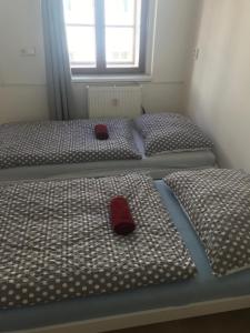 Postel nebo postele na pokoji v ubytování Old Town Apartments S12
