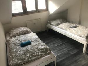 Postel nebo postele na pokoji v ubytování Old Town Apartments S12