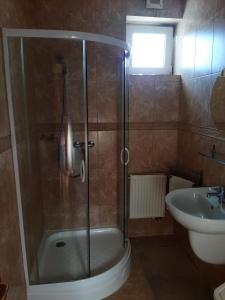 Kúpeľňa v ubytovaní Kondics Apartmanház