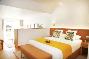 Säng eller sängar i ett rum på Augusta Eco Wellness Resort 4 Superior