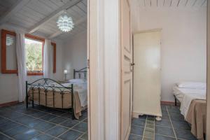 Postel nebo postele na pokoji v ubytování Agriturismo Agrimaccari Marzamemi-Vendicari - Esperienza autentica siciliana