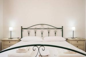 Postel nebo postele na pokoji v ubytování Agriturismo Agrimaccari Marzamemi-Vendicari - Esperienza autentica siciliana