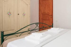 Postel nebo postele na pokoji v ubytování Agriturismo Agrimaccari Marzamemi-Vendicari - Esperienza autentica siciliana