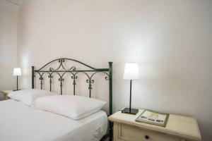 Postel nebo postele na pokoji v ubytování Agriturismo Agrimaccari Marzamemi-Vendicari - Esperienza autentica siciliana