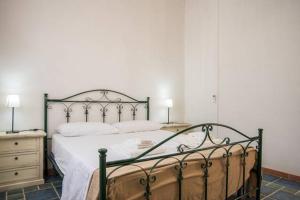 Postel nebo postele na pokoji v ubytování Agriturismo Agrimaccari Marzamemi-Vendicari - Esperienza autentica siciliana