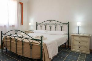 Postel nebo postele na pokoji v ubytování Agriturismo Agrimaccari Marzamemi-Vendicari - Esperienza autentica siciliana