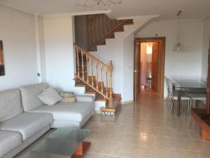 A seating area at First Line Cabo Roig Orihuela Costa