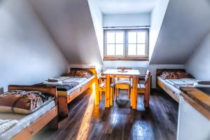 Postel nebo postele na pokoji v ubytování Apartmány Moravský Grunt