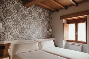 A bed or beds in a room at PR Campanas de San Juan