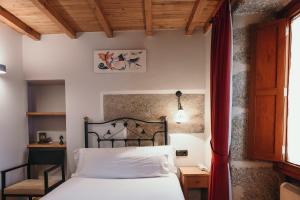 A bed or beds in a room at PR Campanas de San Juan